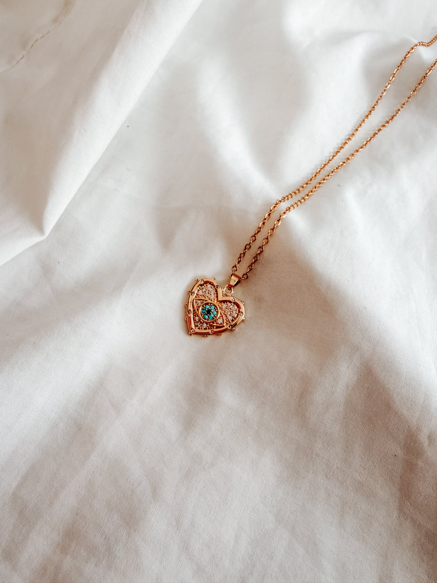 Collana Amelia in acciaio Inox colore oro con ciondolo a cuore con occhio azzurro