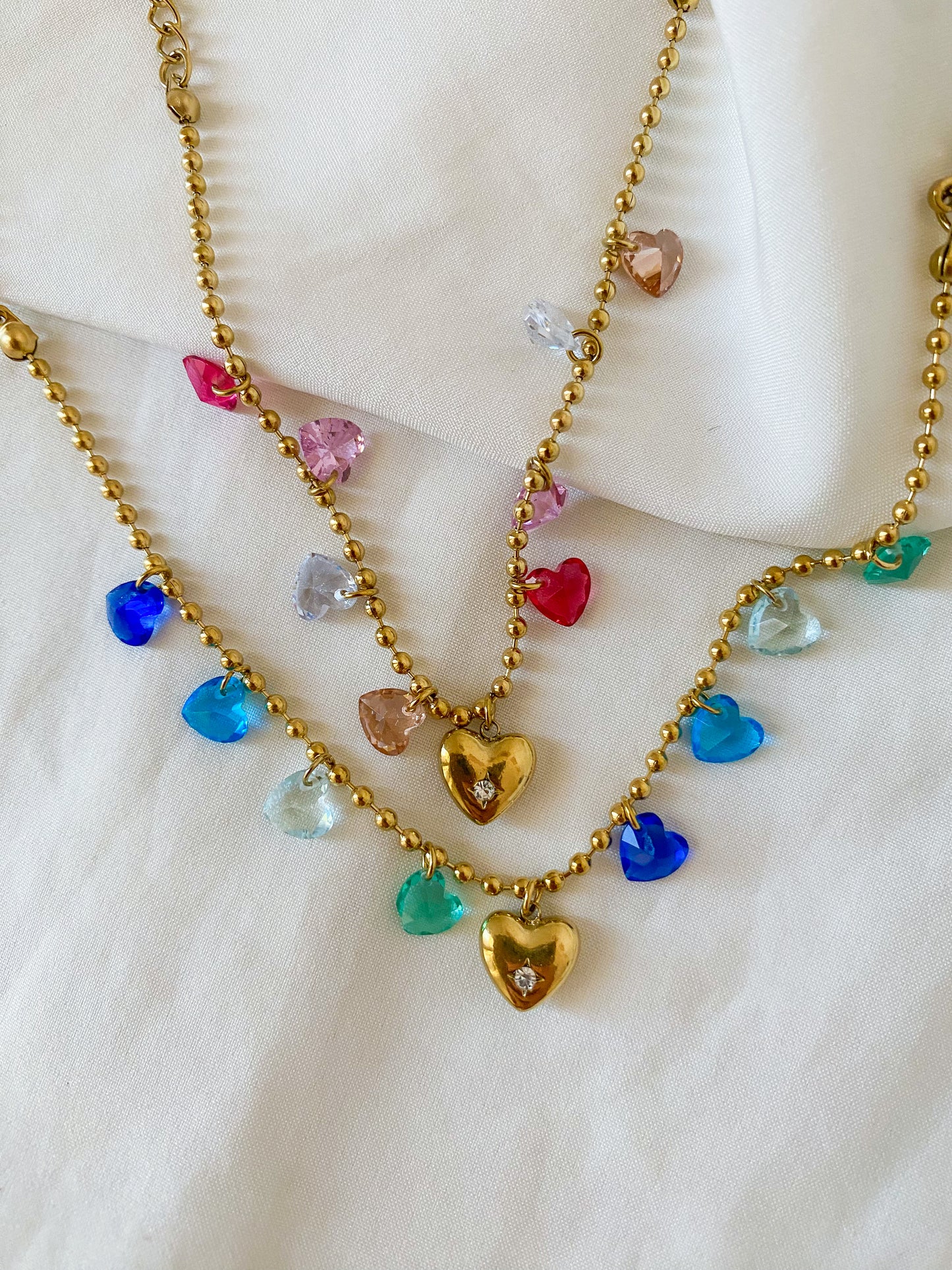 Bracciale “HARRIET” in acciaio inox colore oro, disponibile in tonalità rosa e blu