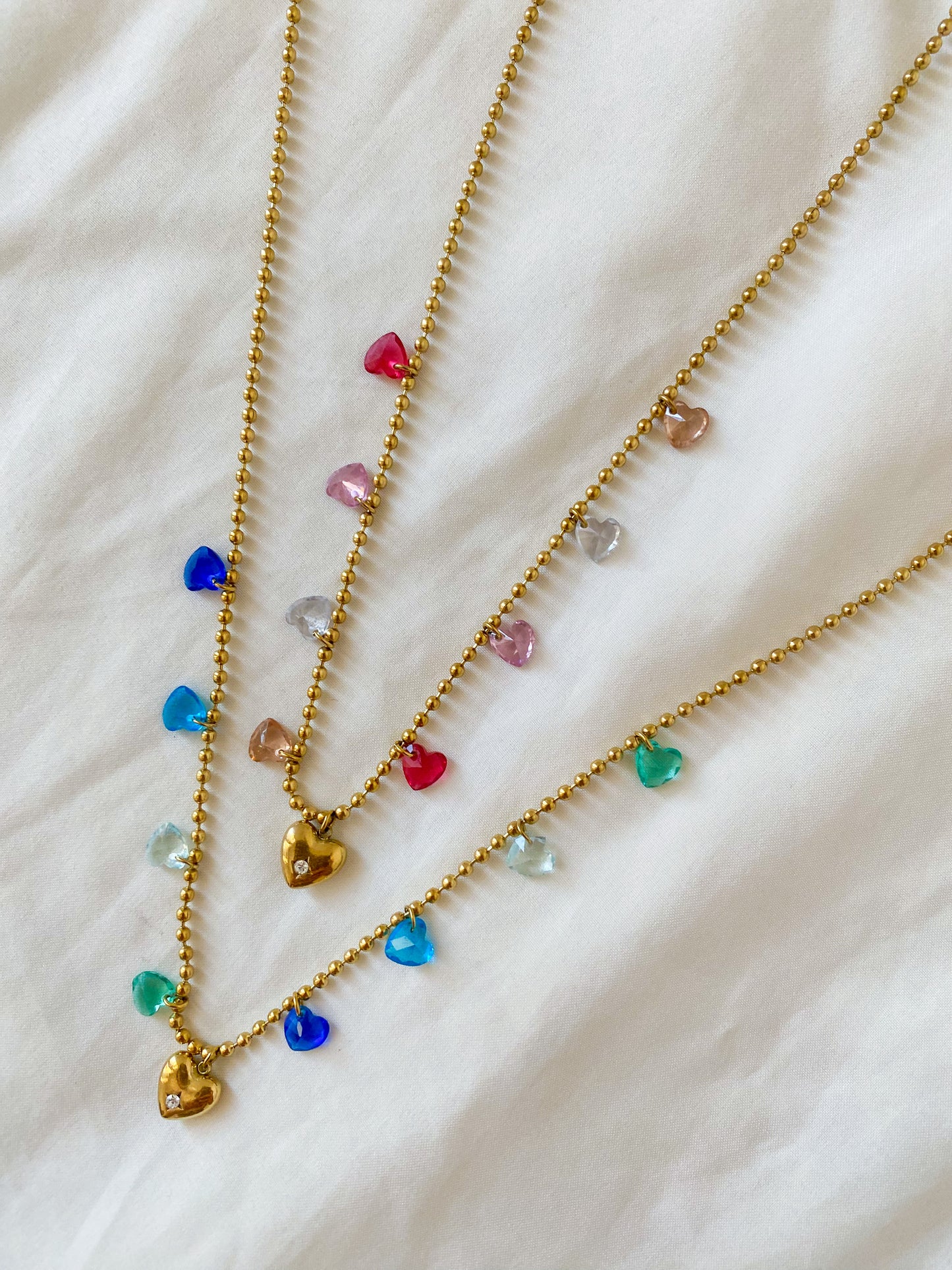 Collana “HARRIET” in acciaio inox colore oro in sue diverse tonalità: rosa e azzurro