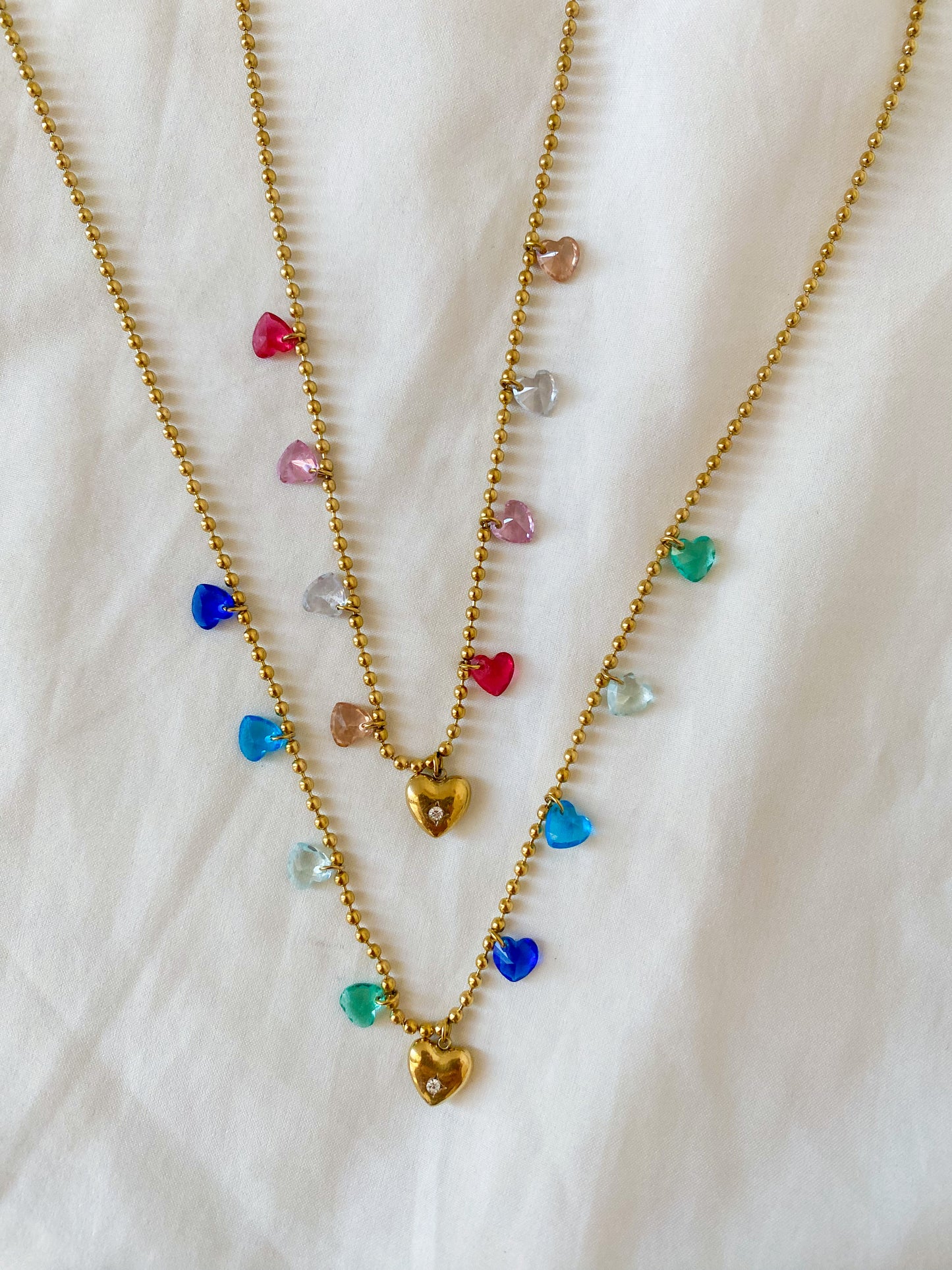 Collana “HARRIET” in acciaio inox colore oro in sue diverse tonalità: rosa e azzurro