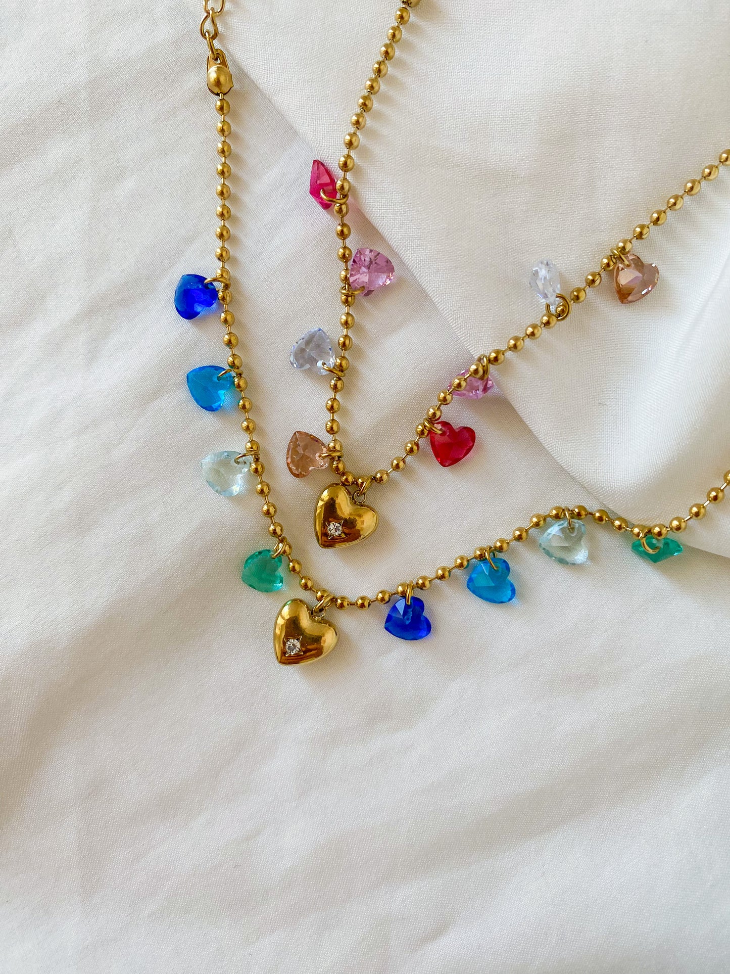 Bracciale “HARRIET” in acciaio inox colore oro, disponibile in tonalità rosa e blu