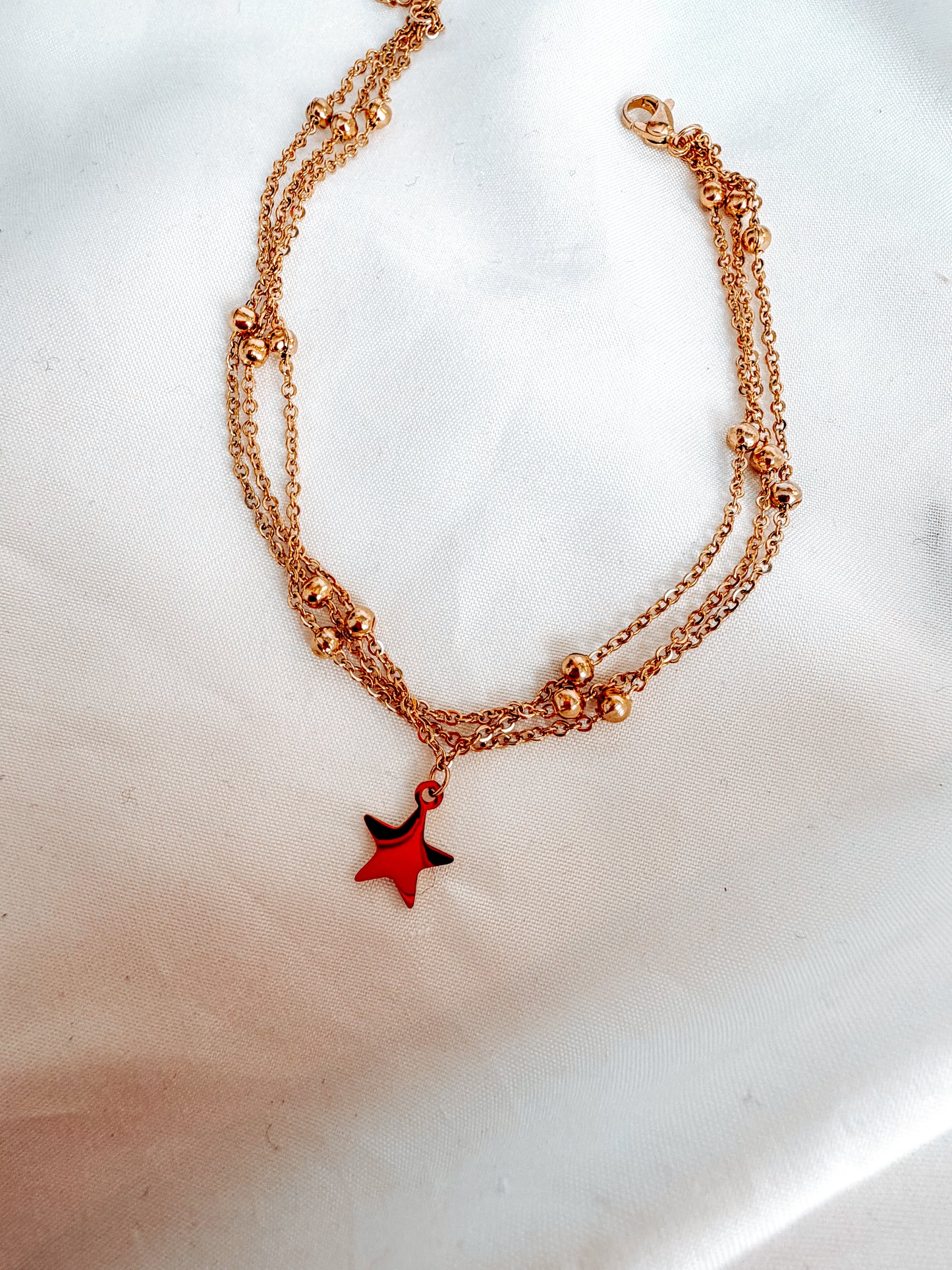 Cavigliera “Caroline” in acciaio inox color oro