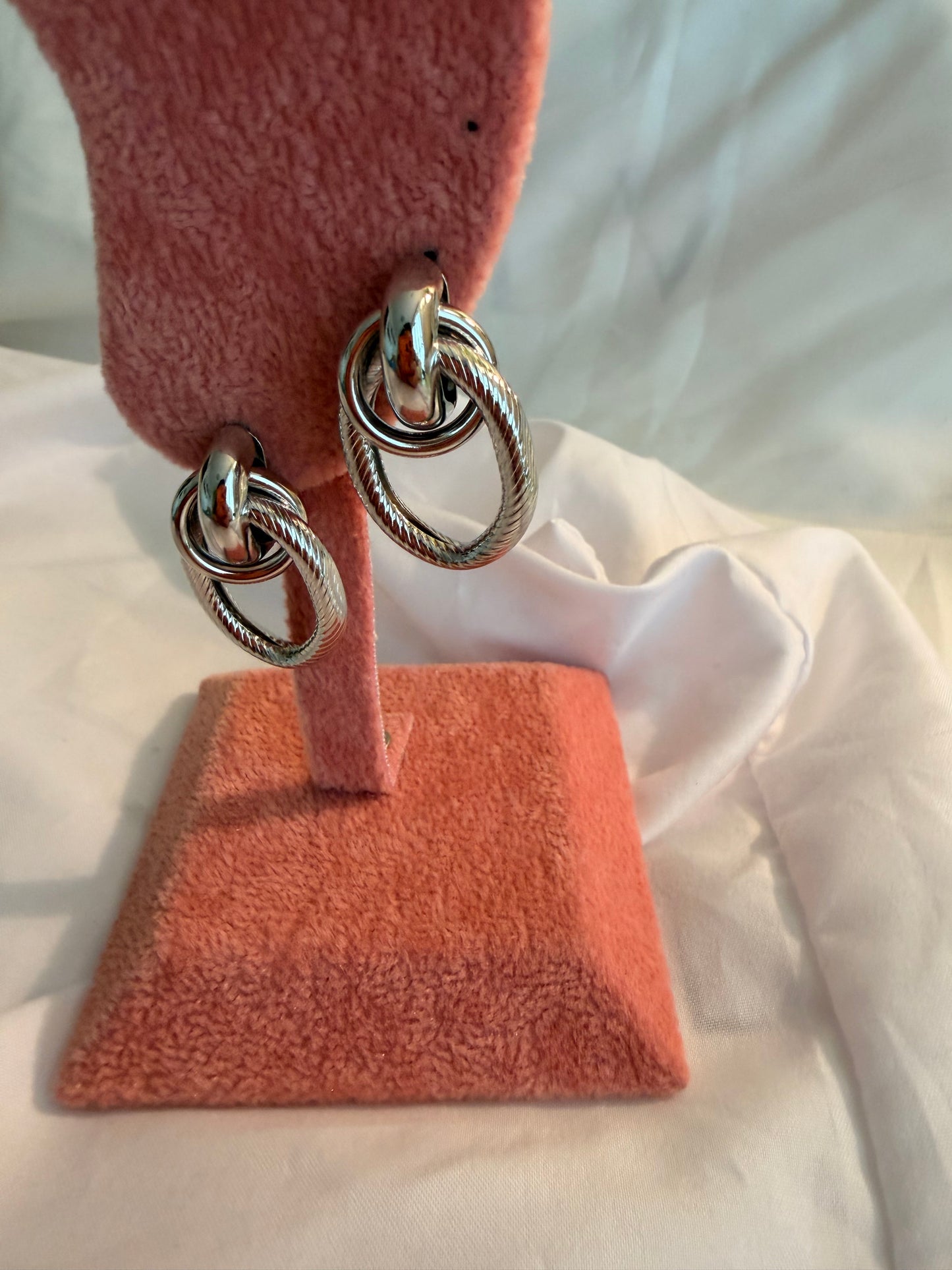 Orecchini “Ipazia” in acciaio inox. Color oro e argento.