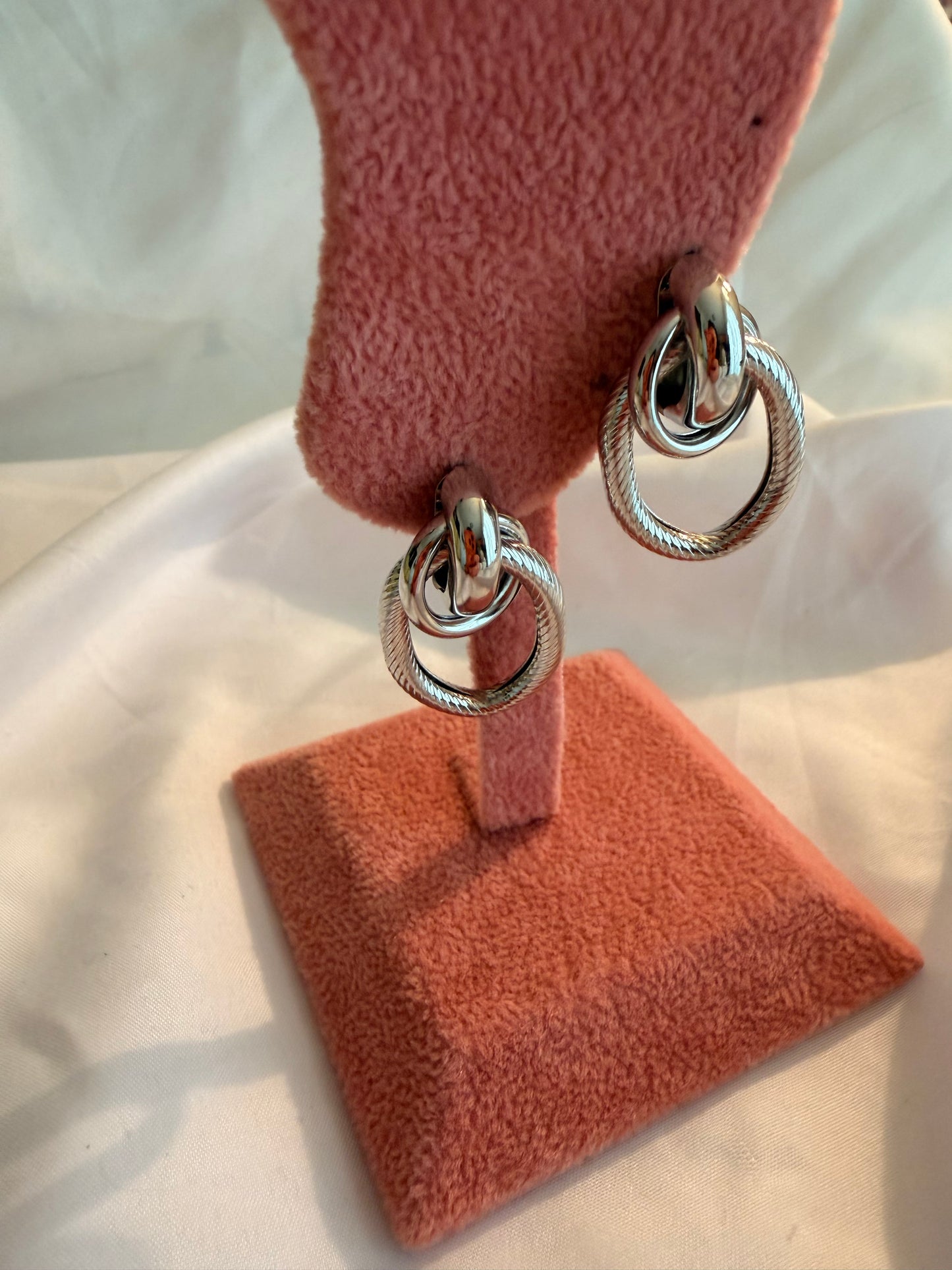 Orecchini “Ipazia” in acciaio inox. Color oro e argento.