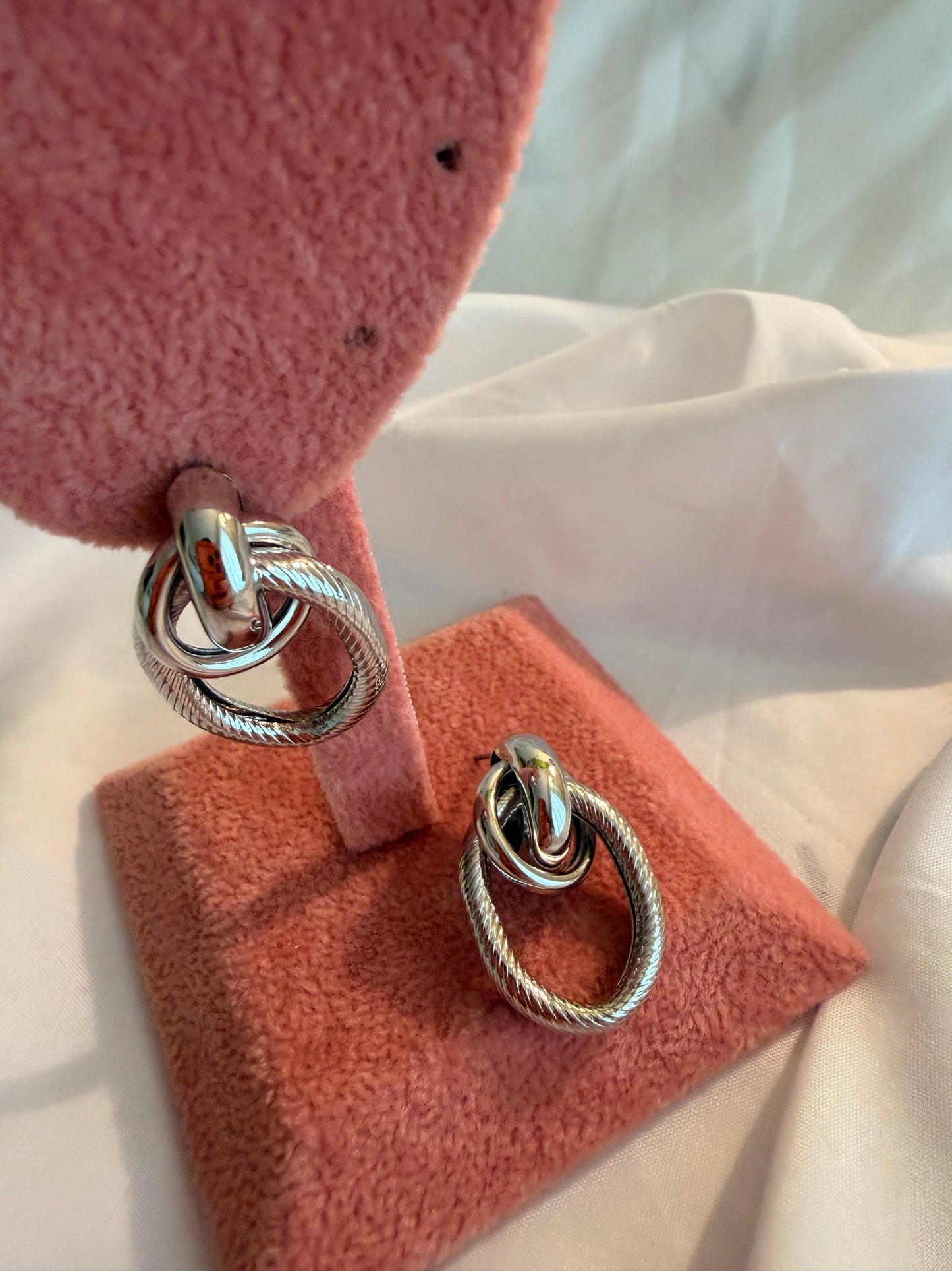 Orecchini “Ipazia” in acciaio inox. Color oro e argento.