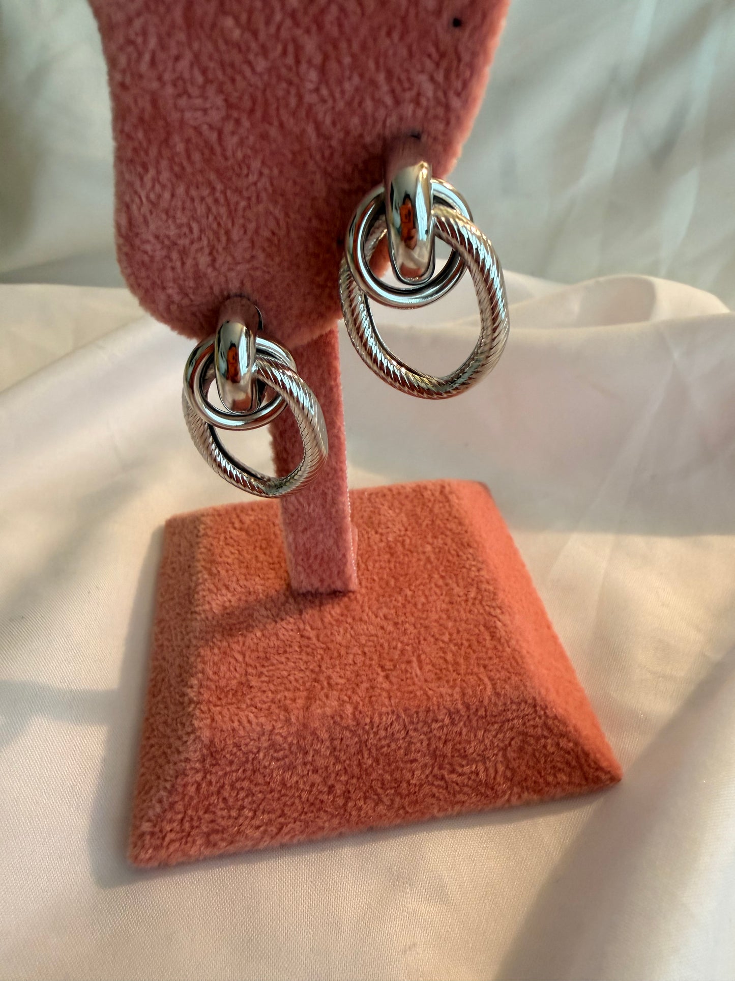 Orecchini “Ipazia” in acciaio inox. Color oro e argento.