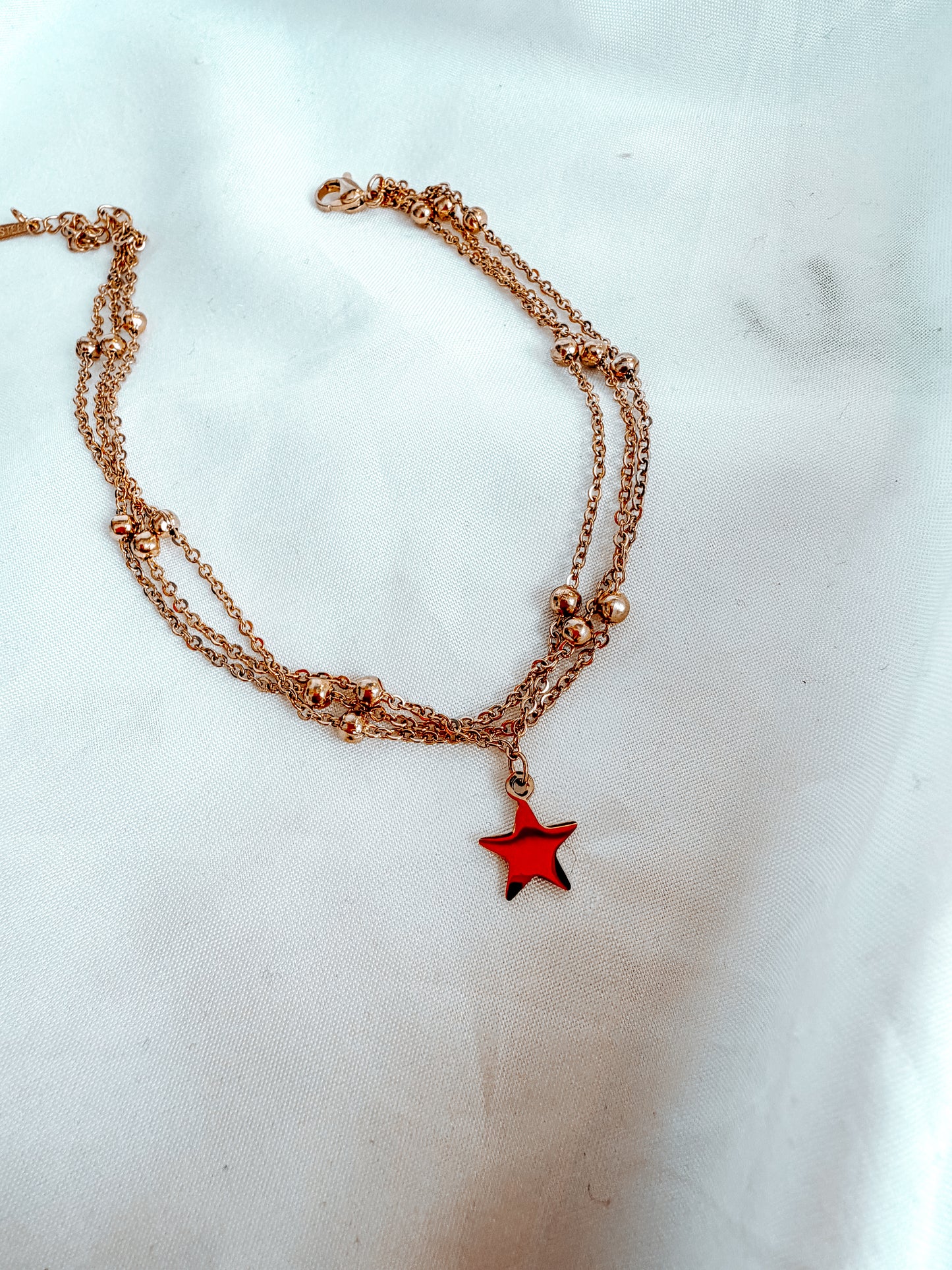 Cavigliera “Caroline” in acciaio inox color oro