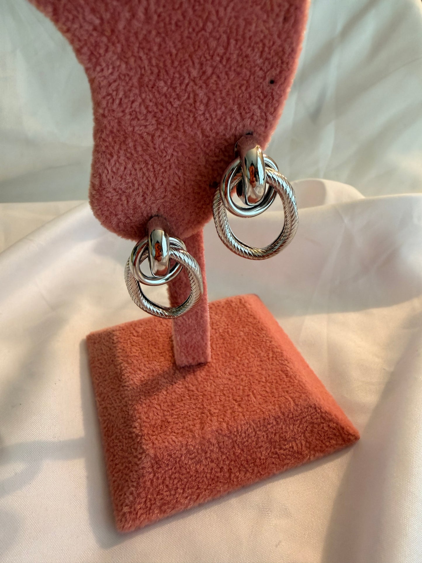 Orecchini “Ipazia” in acciaio inox. Color oro e argento.